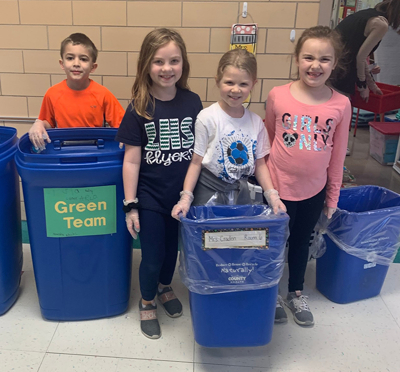 Students collecting recyclables